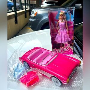 AMC Barbie the movie pink corvette popcorn bucket, doll and drink floats